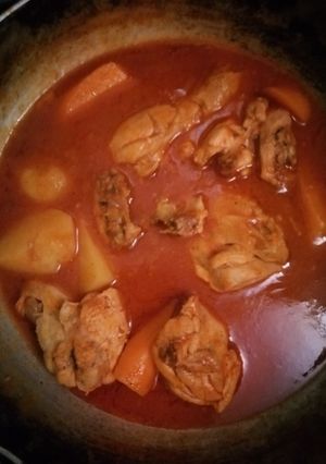 A picture of Chicken in tomato sauce.