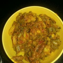 A picture of Aalu beens with curd.