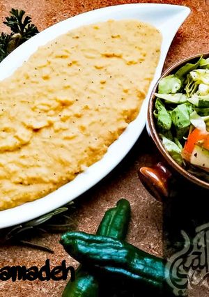 A picture of Yellow Mujadara ; Red lentils with rice.