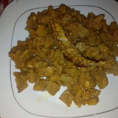 A picture of Unripe Plantain porriage with smoked fish.