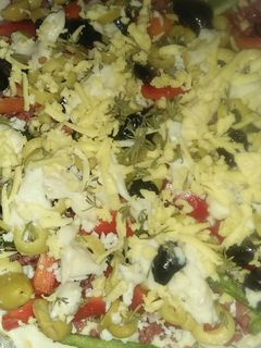 صورة لوصفة بيتزا بصوص بيشاميل
