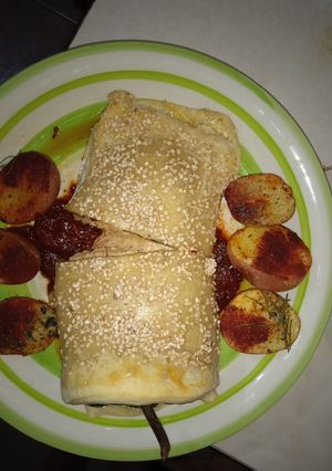 Una foto de Rollo de chile poblano hojaldrado