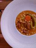Fessolets con chorizo picante, zanahoria y apio