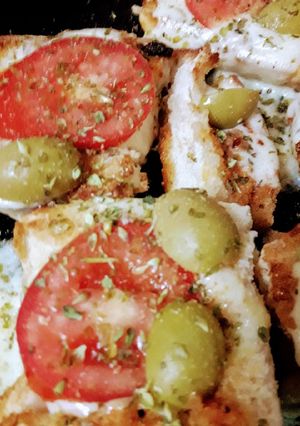 Una foto de Pizzetas con pan duro