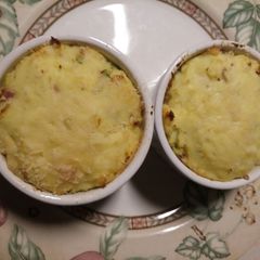 A picture of Asparagus and pancetta mini potato pies.