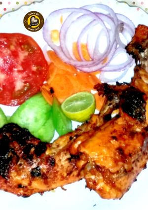 A picture of The Grilled And Charcoaled Chicken.