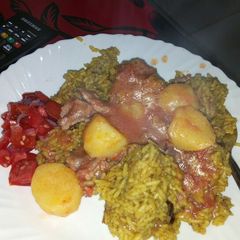 A picture of Pilau with potatoes.