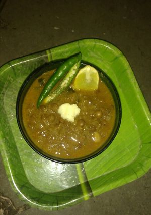 स्मोकी अख्खा मसुराची आमटी (smoky akha masoorchi amti recipe in marathi) रेसिपी चे मुख्य फोटो 
