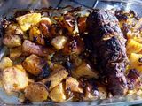 Carne al horno con papas y batatas
