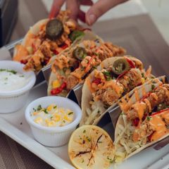 A picture of Crispy chicken tacos with sirracha mayo.