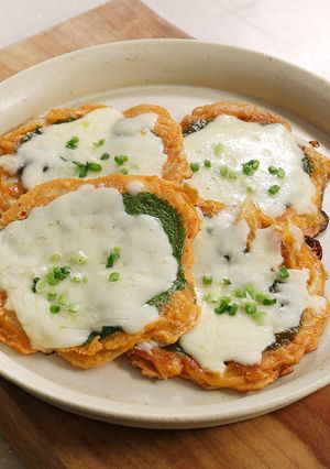 A picture of Kimchi Cheese Pancake (Savory Korean Jeon).