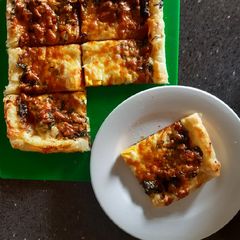 A picture of Caramelised Onion and Spinich Tart.