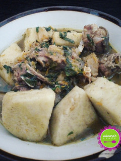 A picture of Goat meat, stock fish and yam pepper soup.