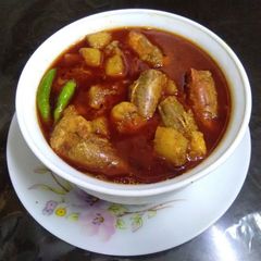 A picture of Chingri maacher malai curry (prawn malai curry).