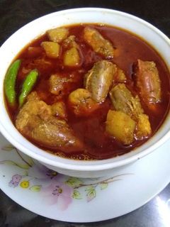 A picture of Chingri maacher malai curry (prawn malai curry).