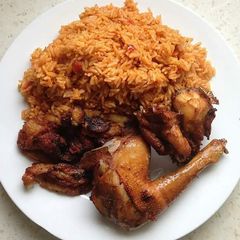 A picture of Deep fried chicken with rice curry.