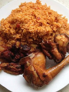 A picture of Deep fried chicken with rice curry.