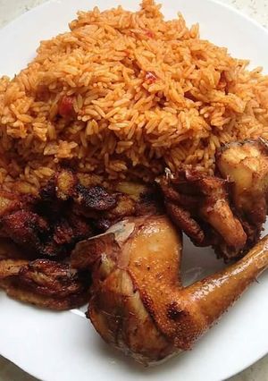 A picture of Deep fried chicken with rice curry.