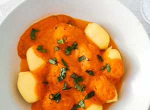 Foto principal de Ñoquis con salsa de cherrys al horno