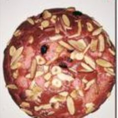 A picture of Strawberry and nuts cake.