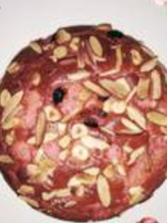 A picture of Strawberry and nuts cake.