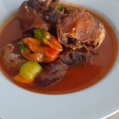 A picture of Fried fish and chicken soup.