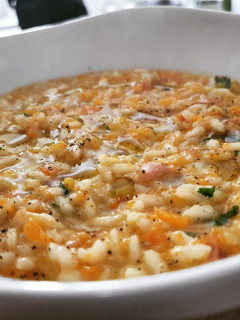 Foto di Risotto di zucca, porro e speck
