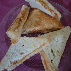 A picture of Chicken vegetables sandwiches.
