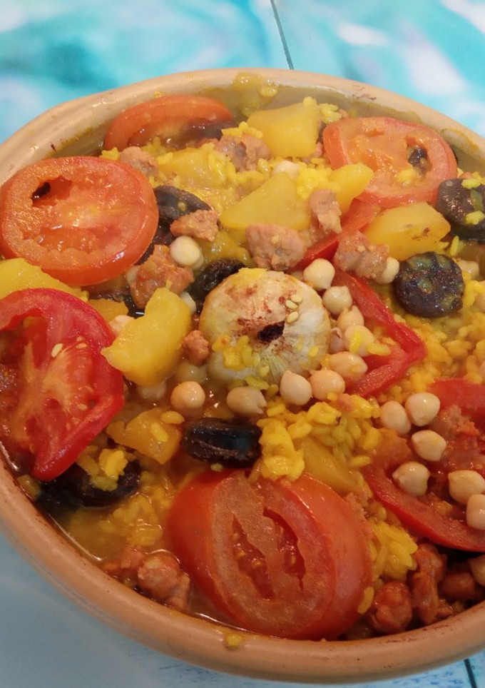 Una foto de Arroz al horno con lo que había por casa 🥘