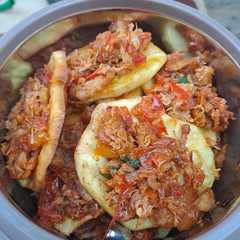 A picture of Sweet potato with chicken dressing.