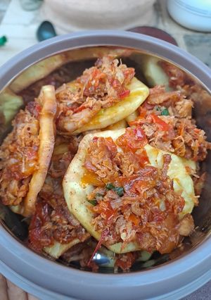 A picture of Sweet potato with chicken dressing.
