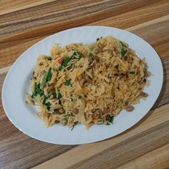 A picture of Jollof rice n beans.