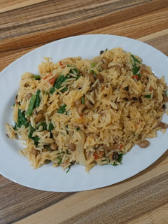 A picture of Jollof rice n beans.