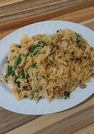 A picture of Jollof rice n beans.