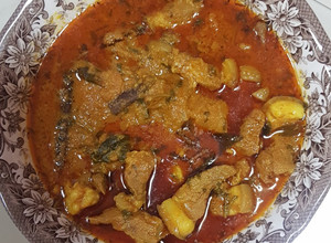 A picture of South Indian Pork vindhalu.