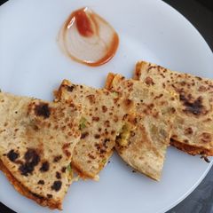 A picture of Leftover roti and sabji sandwich.
