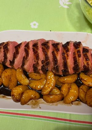 Una foto de Magret de pato en salsa de mandarina