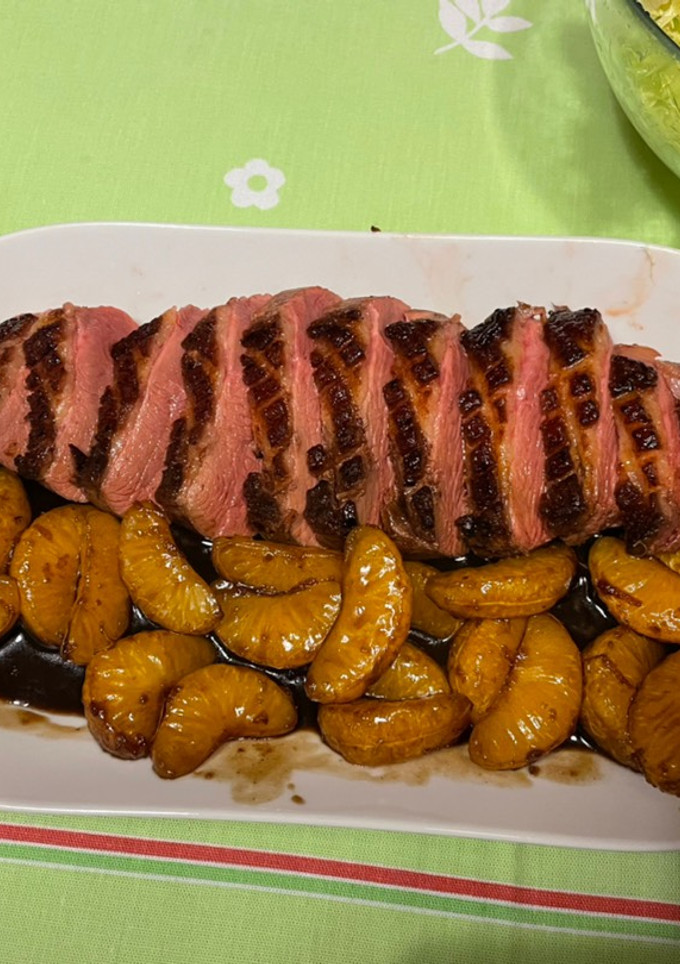 Una foto de Magret de pato en salsa de mandarina
