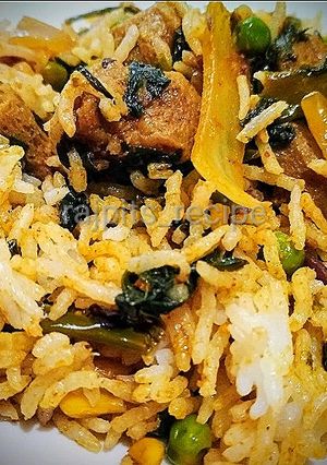 A picture of Manipuri style Spinach soyabean Rice or palak rice.