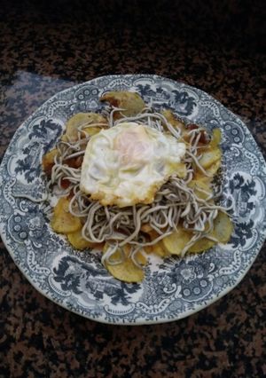 Una foto de Gulas sobre Chile y huevo frito #Cuchillos Arco