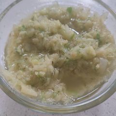 A picture of Ginger Scallion Hot Oil (for dipping with Cantonese BBQ pok).