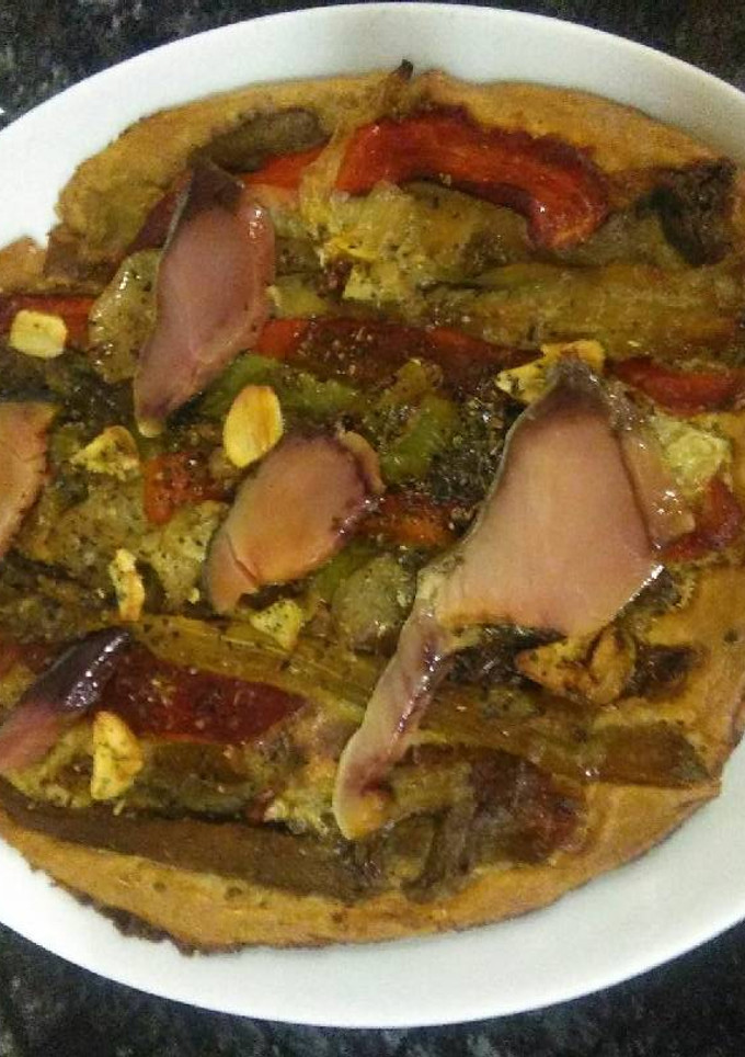 Una foto de Coca de recapte o pizza catalana