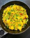 Aloo Matar Chatpata Poha (Flattened rice with peas and potatoes)