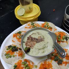Oats mixed idli batter vegetables Idli Chutney A picture of Oats mixed idli batter vegetables Idli Chutney.