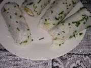 Una foto de queso filadelfia con ciboulette