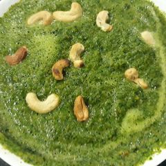 A picture of Vegetable with cashew toppings.