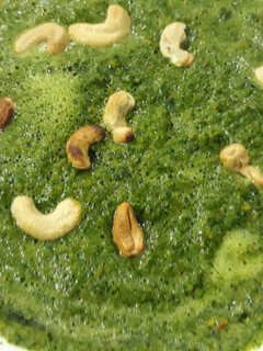 A picture of Vegetable with cashew toppings.