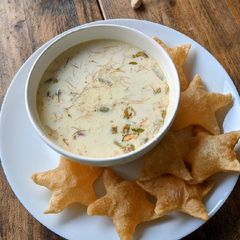 A picture of Seviyan kheer and Puri.