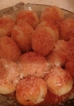 Una foto de Ñoquis rellenos de jamon y queso