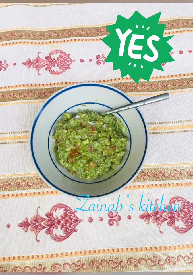 A picture of Guacamole🥑🍅🧅.